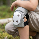 CHANTY Casco infantil + Set de protección – Beige arena